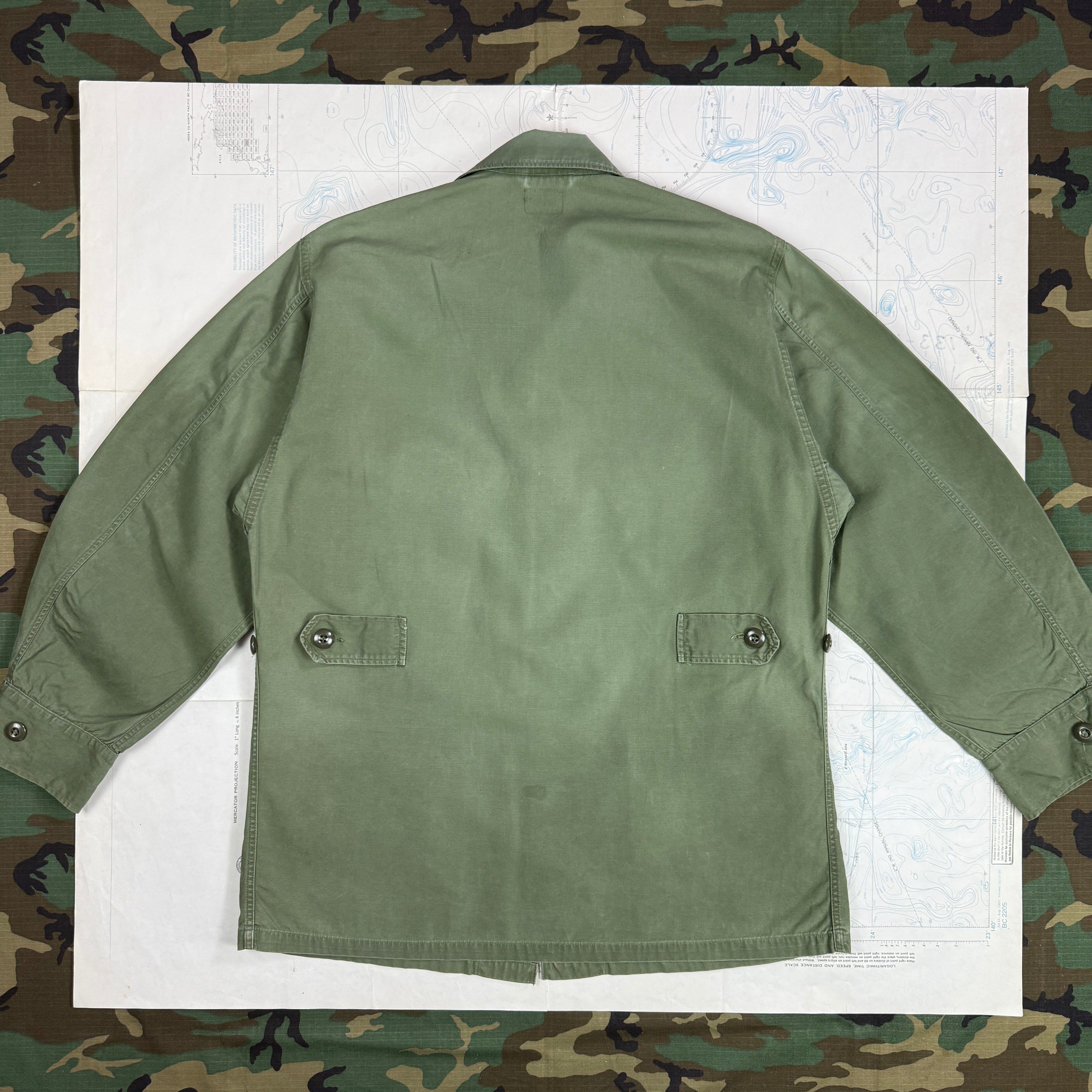US Army 1964 Exposed Button 1st Pattern Jungle Jacket with Patches