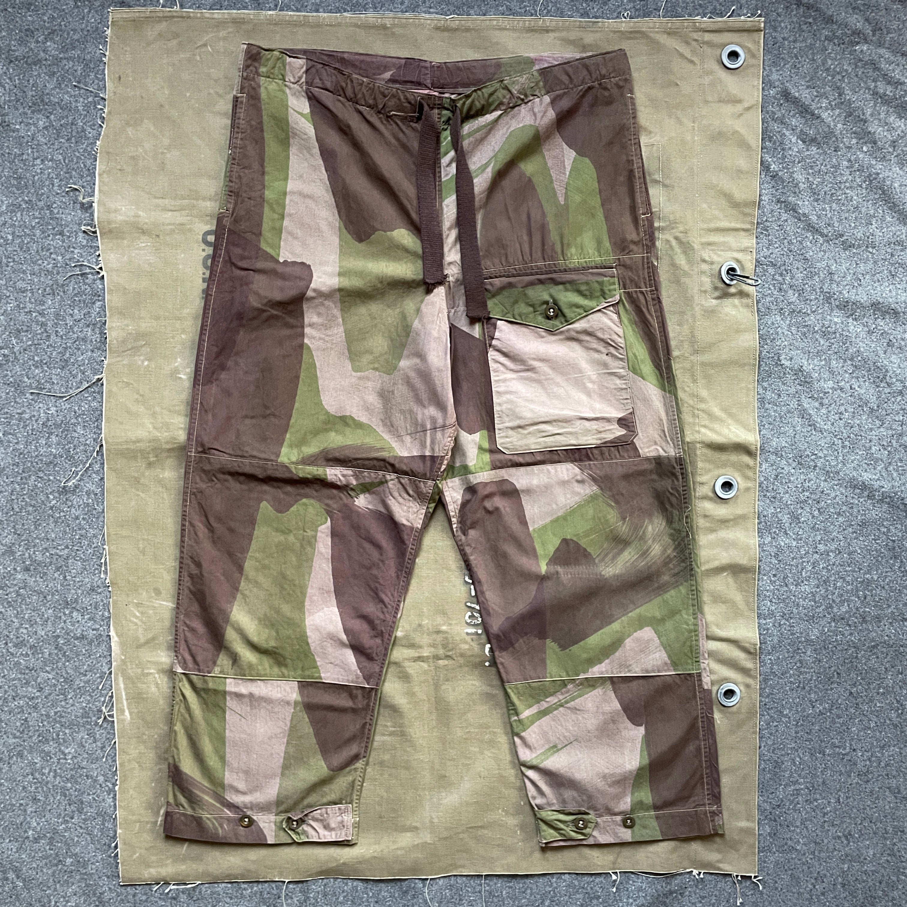 http://themajorstailor.com/cdn/shop/products/British-ww2-windproof-camo-pants-2.jpg?v=1649175302