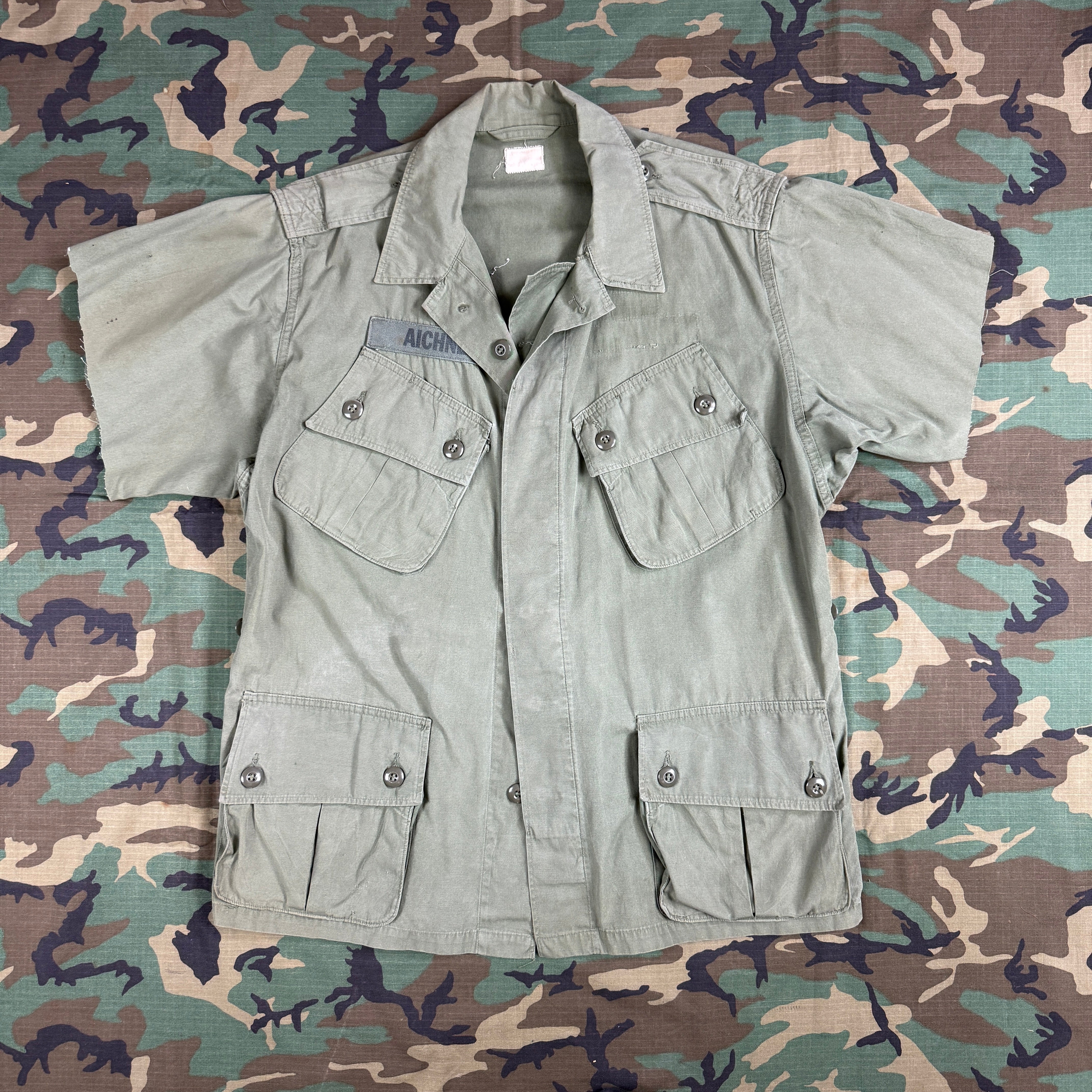 US Army 1964 Exposed Button 1st Pattern Jungle Jacket - Named to Green Beret