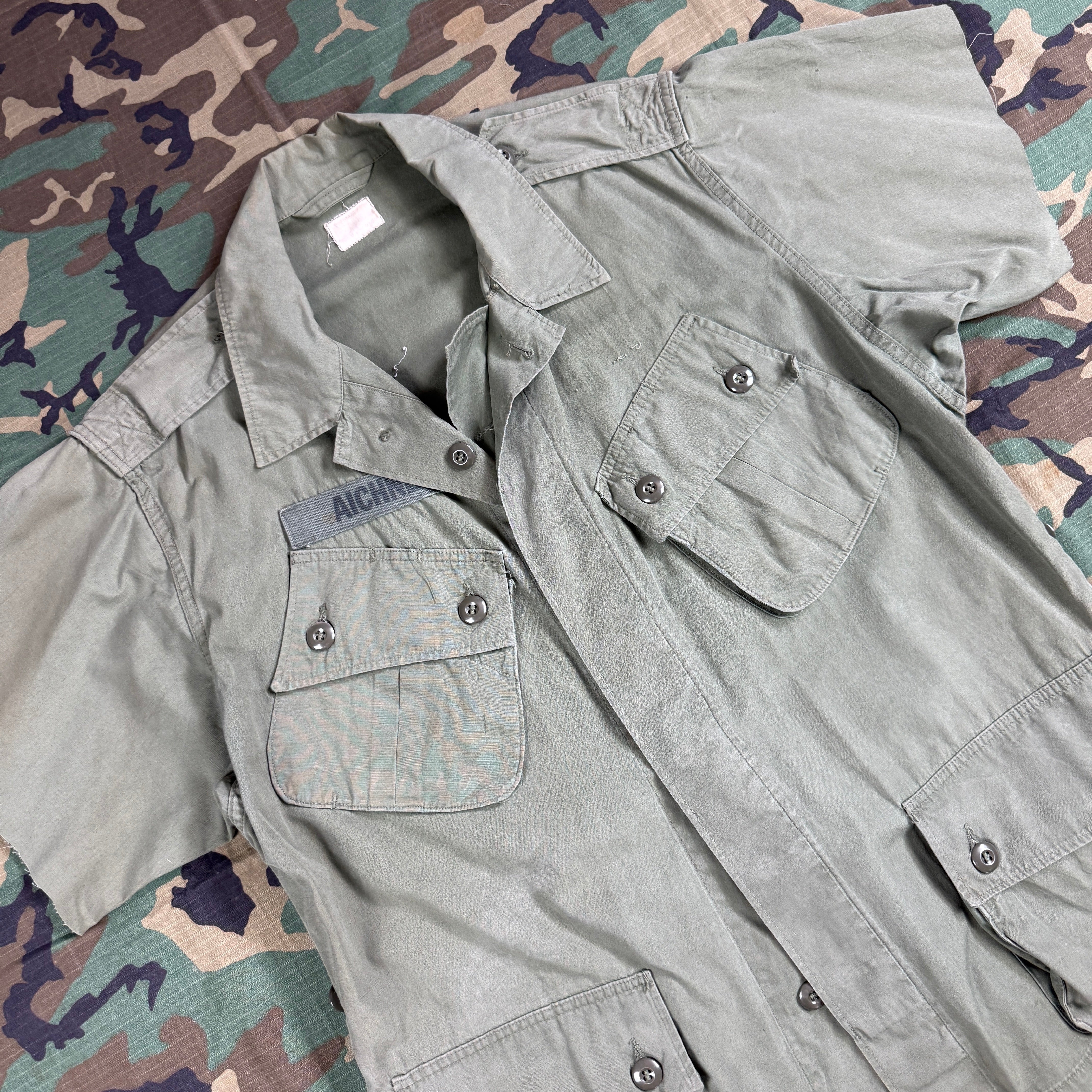 US Army 1964 Exposed Button 1st Pattern Jungle Jacket - Named to Green Beret