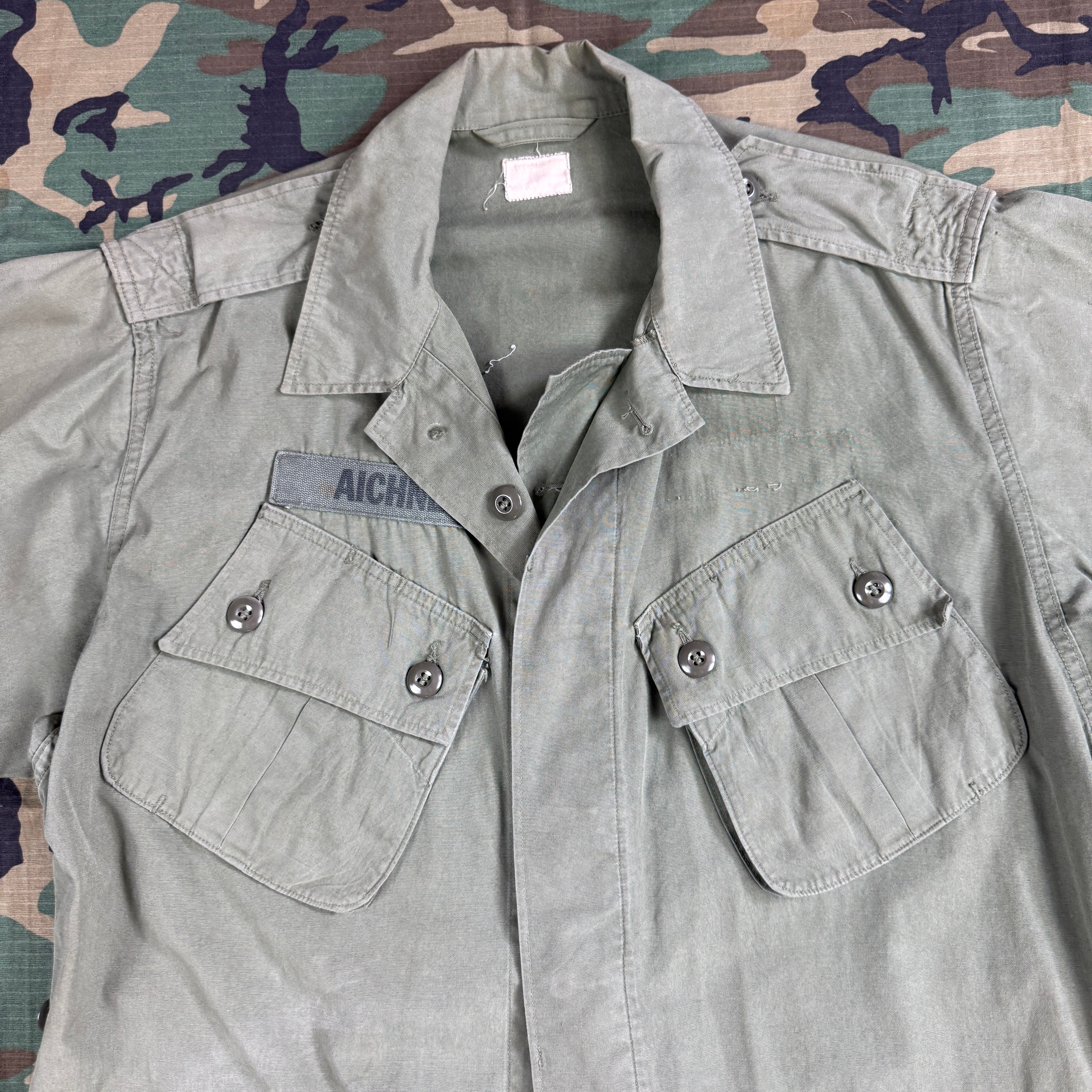 US Army 1964 Exposed Button 1st Pattern Jungle Jacket - Named to Green Beret