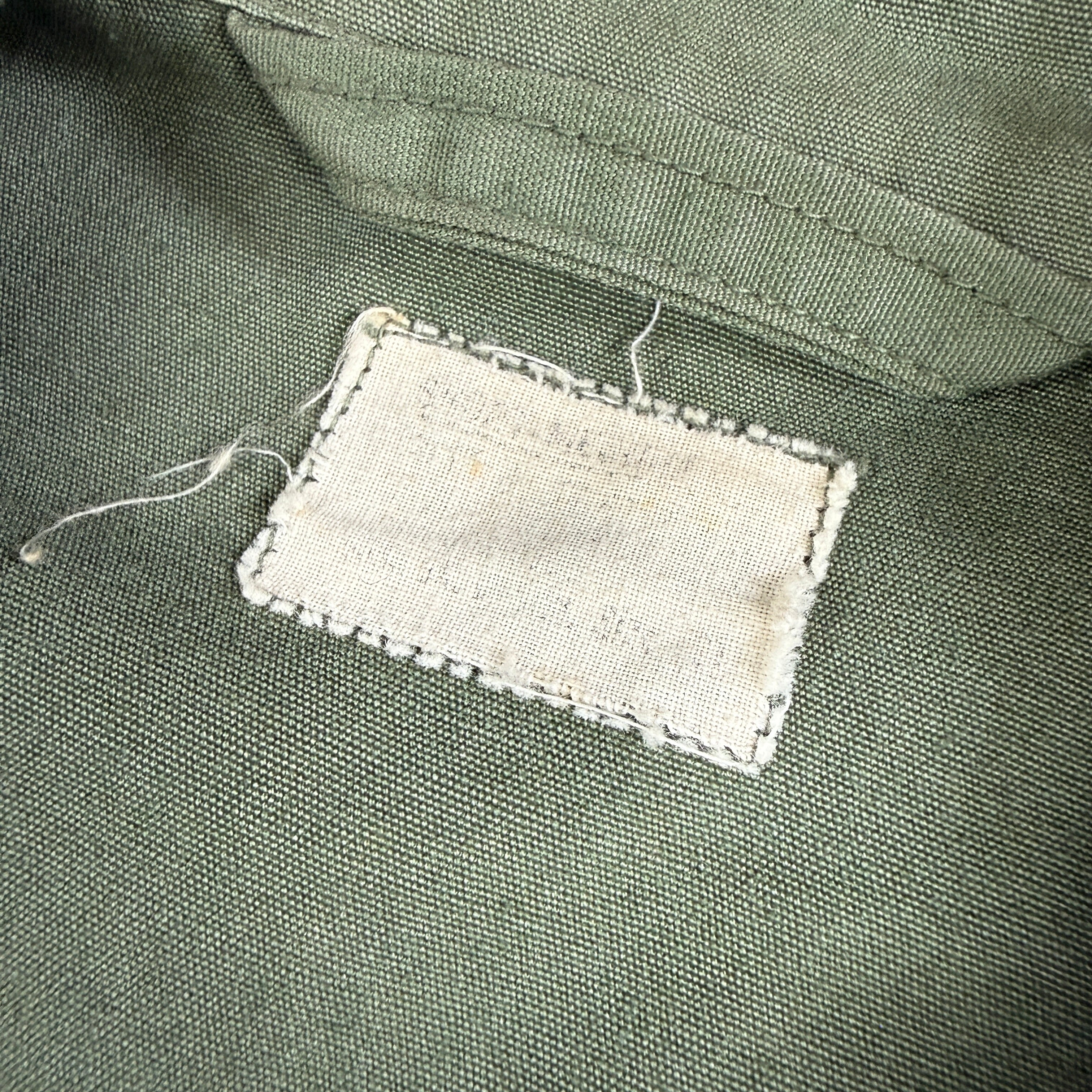 US Army 1964 Exposed Button 1st Pattern Jungle Jacket - Named to Green Beret