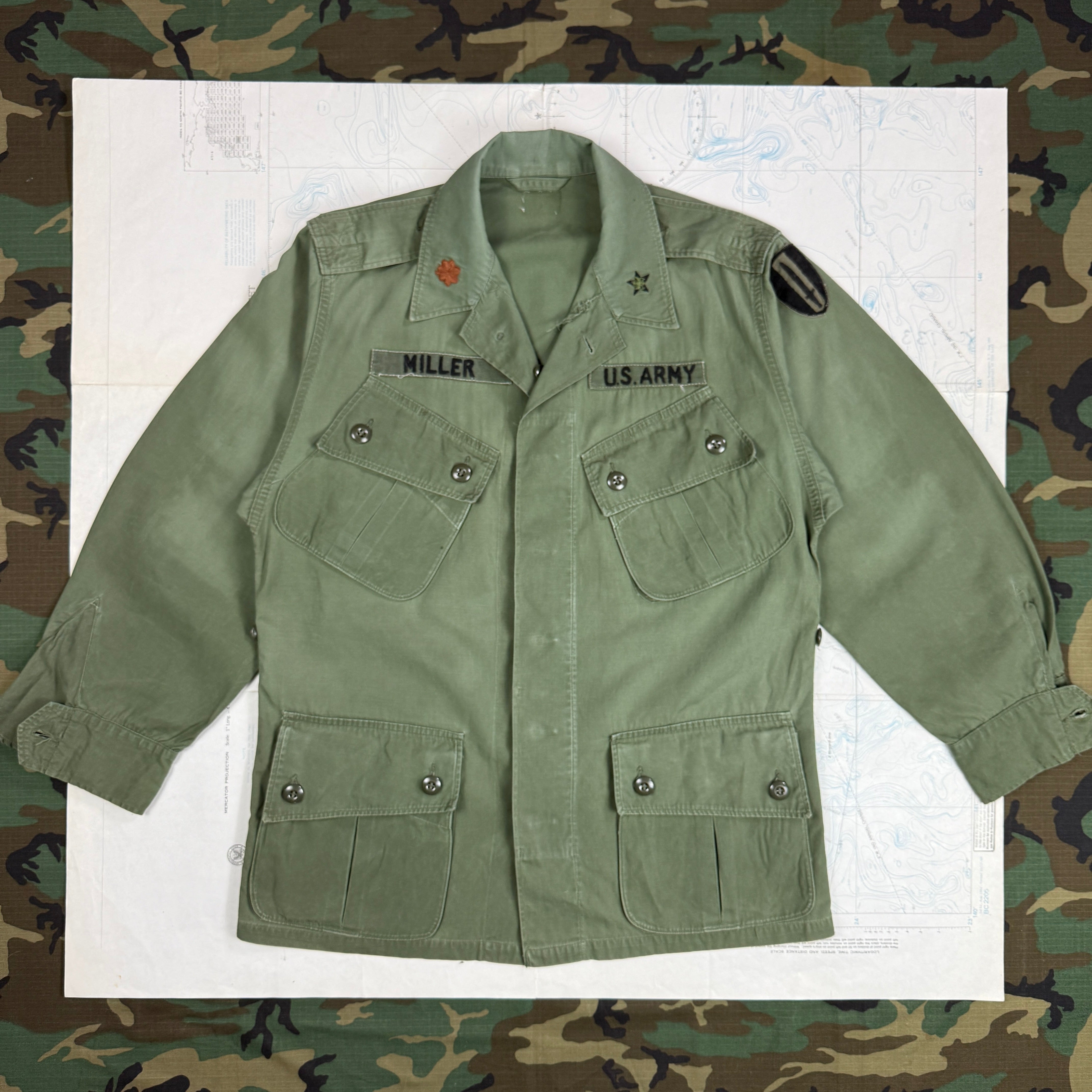 US Army 1964 Exposed Button 1st Pattern Jungle Jacket with Patches