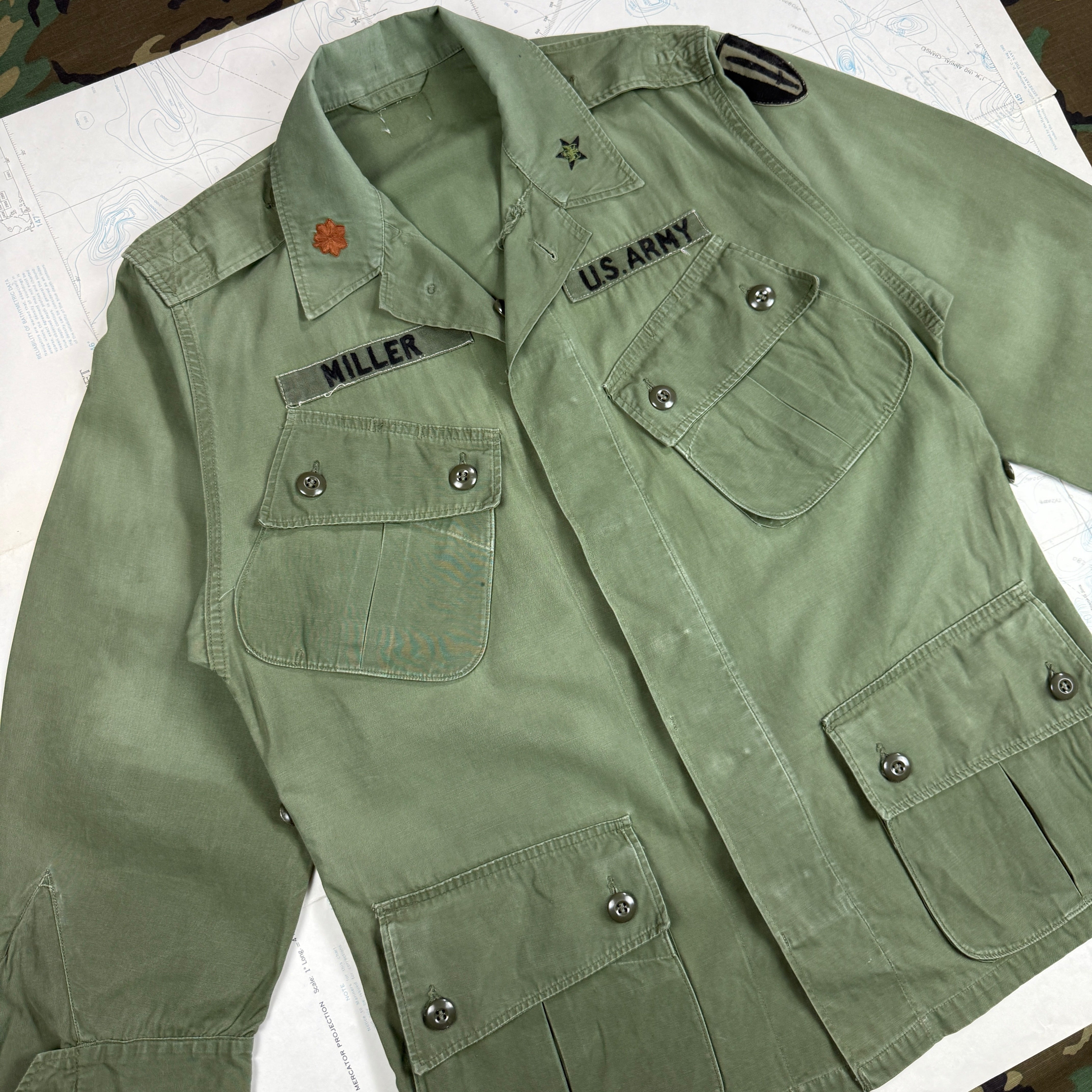 US Army 1964 Exposed Button 1st Pattern Jungle Jacket with Patches