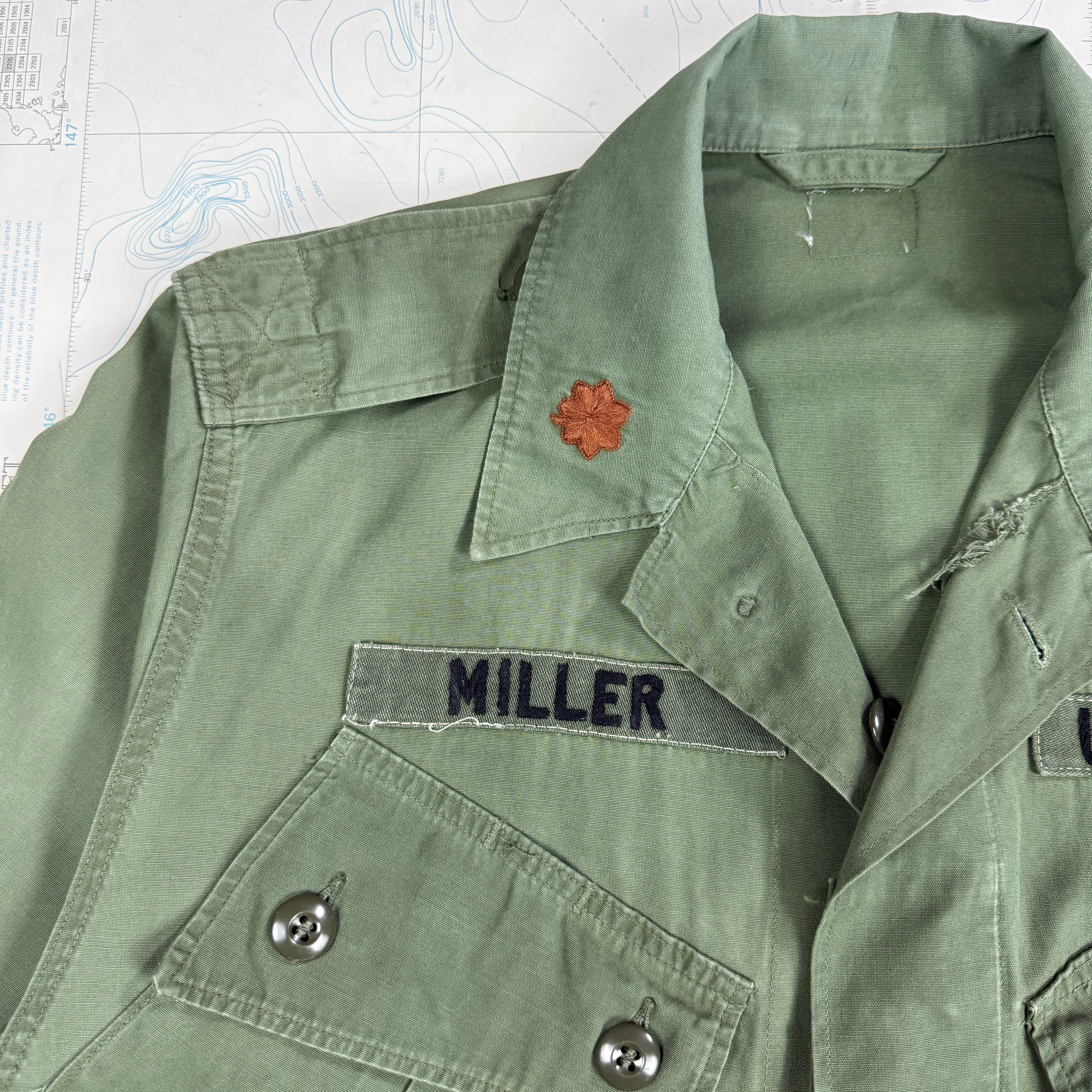US Army 1964 Exposed Button 1st Pattern Jungle Jacket with Patches