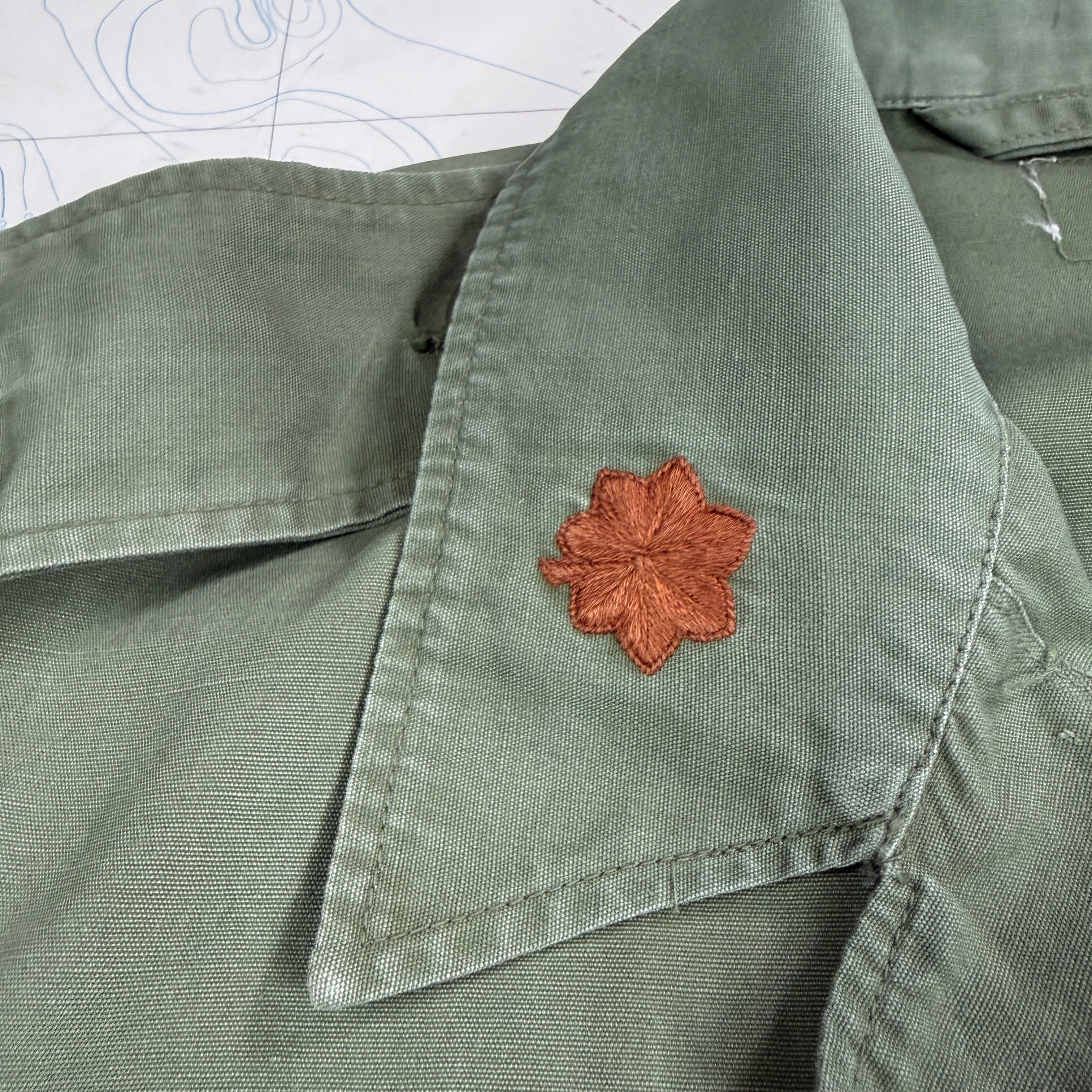 US Army 1964 Exposed Button 1st Pattern Jungle Jacket with Patches